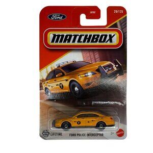 Matchbox Ford Police Interceptor Yellow Taxi Diecast Car NIP